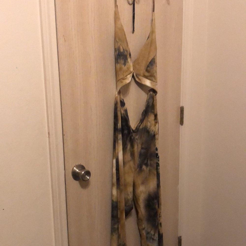 SOLD Fashion Nova Bellbottom Cut Out One Piece Jumper